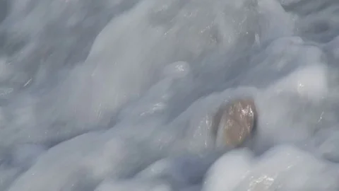 Close up of waves breaking on beach (1) Stock Footage 71391413