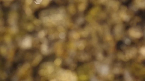 Close up of waves breaking on the pebbles beach. Blur effect with Bokeh. 库存影片 93965466