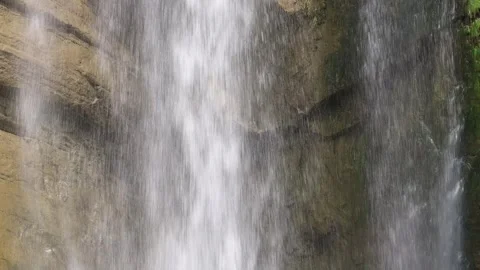 Close up of the waves in the broad flow in the middle of the waterfall. Video stock 278186493