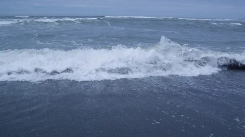 Close up of waves crashing into the beach Stock Footage 81344530