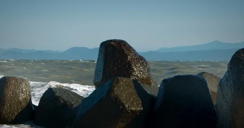 Close Up of Waves Crashing Off Rocks on the Coast of Japan Stock Footage 125715622