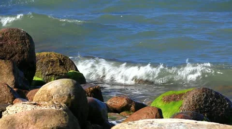 Close up of waves crashing on stony Beach Shore on the german Baltic Sea Stock Footage 11134431