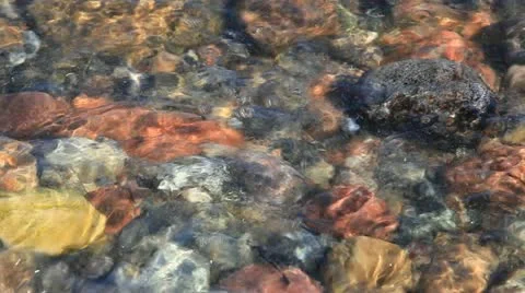 Close up of waves crashing on stony Beach Shore on the german Baltic Sea Stock Footage 11134447