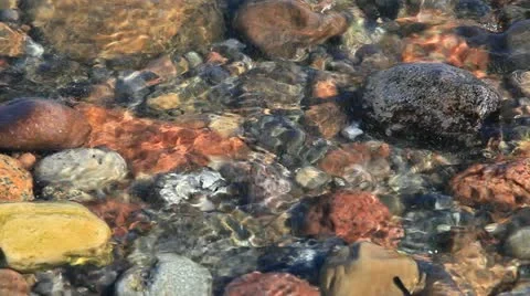 Close up of waves crashing on stony Beach Shore on the german Baltic Sea Stock Footage 11134575