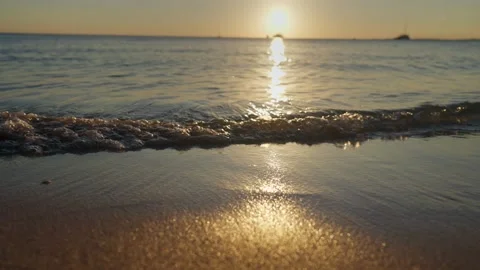 Close up of waves on crystal clear tropical island blue water Видео 235728191