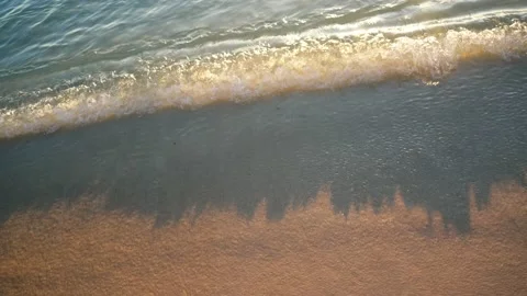 Close up of waves on crystal clear tropical island blue water Stockbeeldmateriaal 235728193