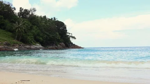 Close up of waves gently breaking onto a sandy beach. Stock Footage 324106959