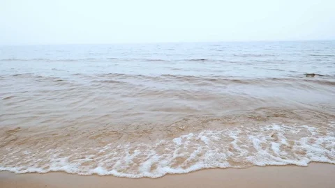 Close up of waves on lake or sea near beach line. Stock Footage 108126274