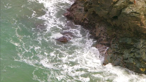Close up of waves lapping against rocks Video stock 95604781
