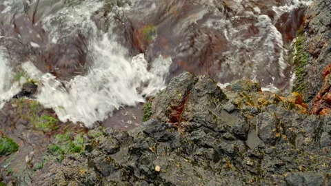 Close-up of waves on rock formation Baltic Sea Bornholm Denmark 스톡 동영상 331079586