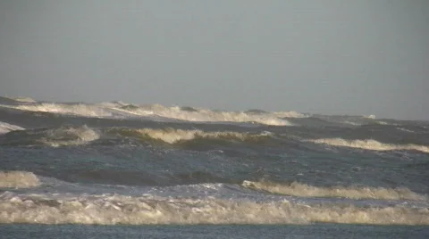 Close-up of waves rolling onto the beach Stock Footage 108291