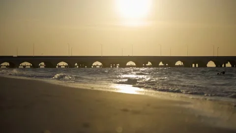 Close up waves rolling over the sand during sunset in Puerto Progreso, Stock Footage 190068116