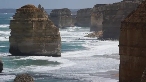 Close Up - Waves Rolling By the Twelve Apostles Rock Formations Australia Stock Footage 80630975