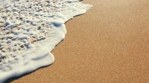 Close Up Of Waves Rolling up White Sandy Beach with Instagram Filter. Stock Footage 53893074
