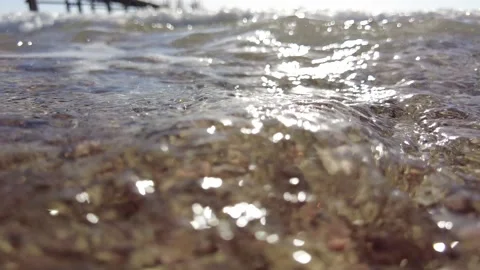 Close-up of waves on the sea beach slow mo Stock Footage 167372642