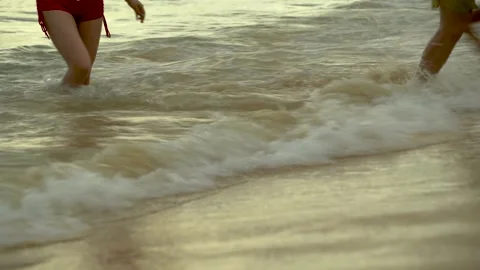 Close-up Waves washing yellow sand Stock Footage 309828312