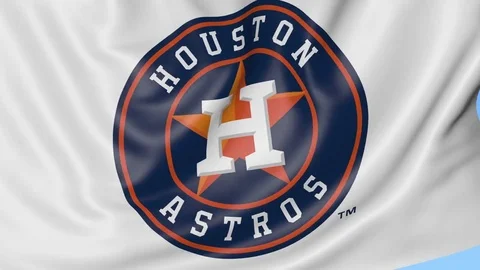 Close-up of waving flag with Houston Astros MLB baseball team logo, seamless Stock Footage