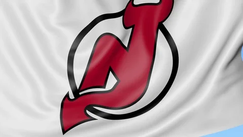 Close-up of waving flag with New Jersey Devils NHL hockey team logo, seamless Stock Footage 72131510