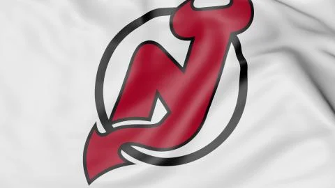 Close-up of waving flag with New Jersey Devils NHL hockey team logo, 3D Illustrazione stock