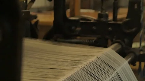 Close up on a waving machine inside a Tartan waving mill 스톡 동영상 98886904