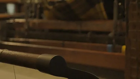 Close up on a waving machine inside a Tartan waving mill 스톡 동영상 98886912