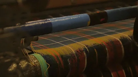Close up on a waving machine inside a Tartan waving mill 스톡 동영상 98887123