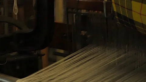 Close up on a waving machine inside a Tartan waving mill 스톡 동영상 98887157