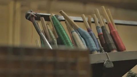 Close up on a waving machine inside a Tartan waving mill 스톡 동영상 98887176