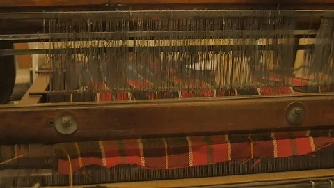 Close up on a waving machine inside a Tartan waving mill 스톡 동영상 98887350