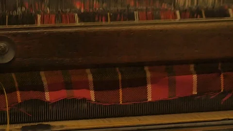 Close up on a waving machine inside a Tartan waving mill 스톡 동영상 98887382