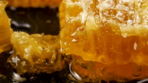 Close-up of wax cells with bee honey. Shooting macro. Healthy eating concept. Stock Footage 313349630