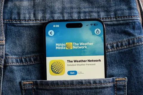 Close up of The Weather Network app on smartphone. Toronto, Canada - July 24, Stock Photos