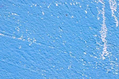 Close-up of Weathered Blue Textured Wall with Cracks and Peeling Paint Photos