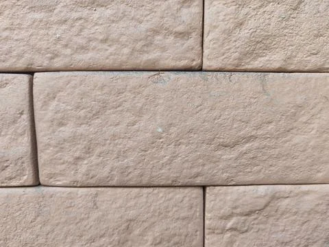 Close Up of Weathered Brick Wall Texture with Natural Surface Detail Foto stock