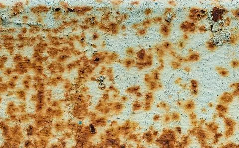 Close-Up of Weathered Rusty Metal Surface with Textured Patterns 写真素材