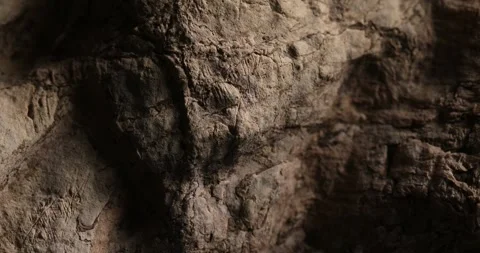 Close-up of Weathered Stone Surface with Cracks Stock Footage 287878994