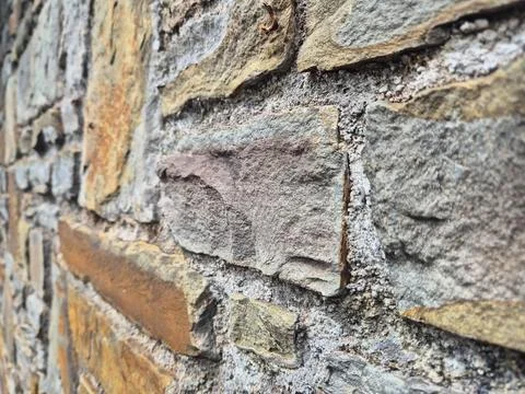 Close up of weathered stone wall with rough concrete texture Stock Photos
