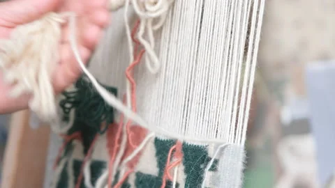 Close up, weaving handmade carpet. 4k, slow motion with natural sound effect. Stock Footage 197107559