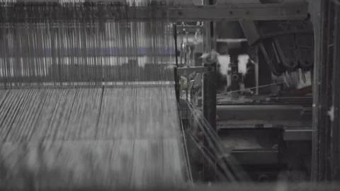 Close-up of weaving machine automatic to make cloth Stock Footage 248798639