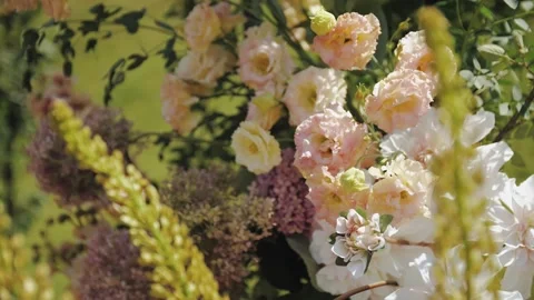 Close-up of wedding arch decorated with flowers, wedding ceremony. An Exquisite Stock Footage 307338593