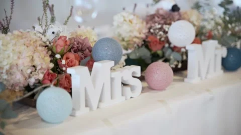 Close up wedding decorations Mr and Mrs on the wedding table Stock Footage 239733987