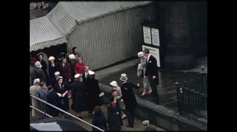 Close Up Wedding Guests Arrive at St. John's Church Edinburgh 1957 Video stock 48235189