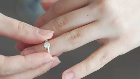 Close up wedding ring on the bride's hand Stock Footage 127995329