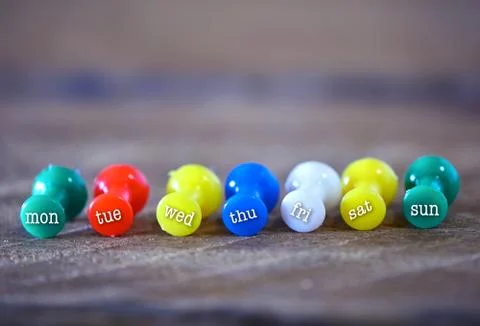 Close up weekly push pins Stock Photos