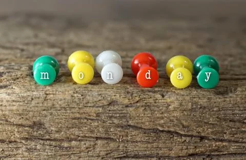Close up weekly push pins,monday. Stock Illustration