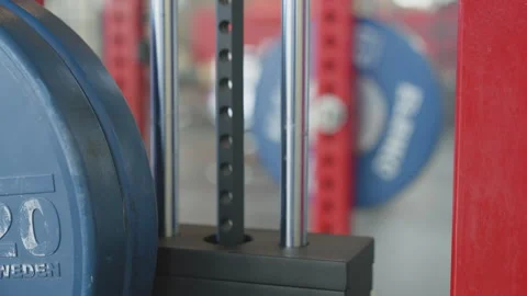 Close up of a weight stack in a gym lifting up and down. Stock Footage 346391697