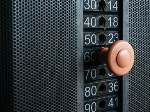 Close-up of weight stack selector on gym machine, representing adjustable r.. Stock Photos