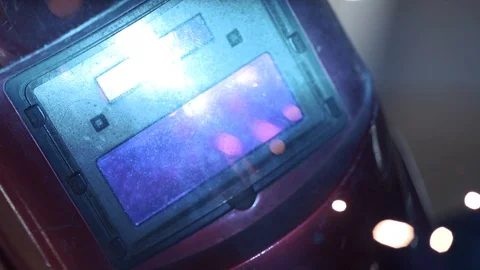 Close-up of welder mask in the work Stock Footage 129285515