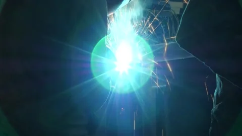 Close-up of welder welds parts using semi-automatic welding machine. Stock Footage 246618249