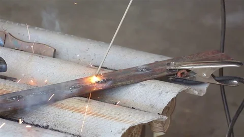 Close-up welding. Electric welder Stock Footage 77553832